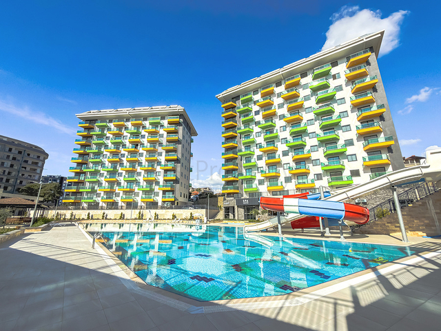 Светлая квартира 1+1 в комплексе с развитой инфраструктурой