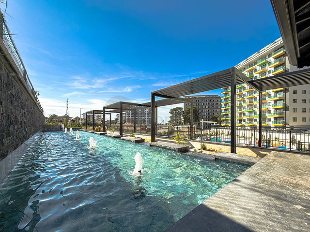 Светлая квартира 1+1 в комплексе с развитой инфраструктурой