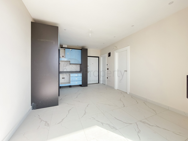 Светлая квартира 1+1 в комплексе с развитой инфраструктурой