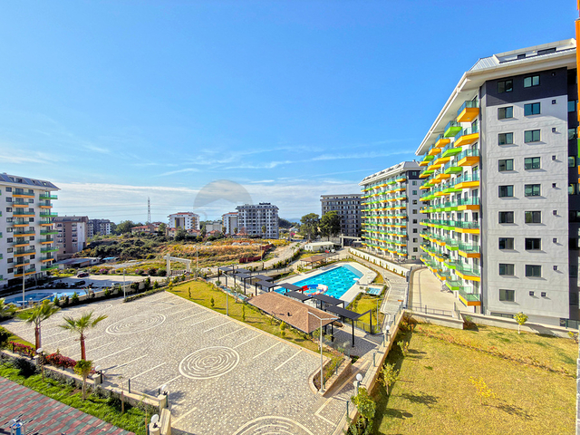 Светлая квартира 1+1 в комплексе с развитой инфраструктурой