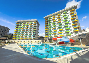 Светлая квартира 1+1 в комплексе с развитой инфраструктурой