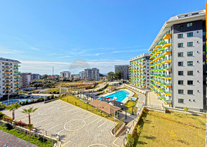 Светлая квартира 1+1 в комплексе с развитой инфраструктурой