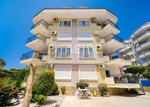 Просторная квартира 2+1 рядом с морем в тихом зеленом районе