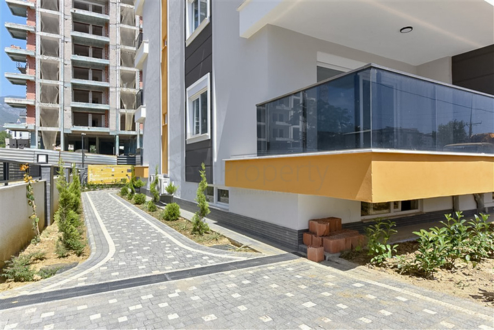 Квартира 2+1 в современном комплексе рядом с морем в Махмутларе