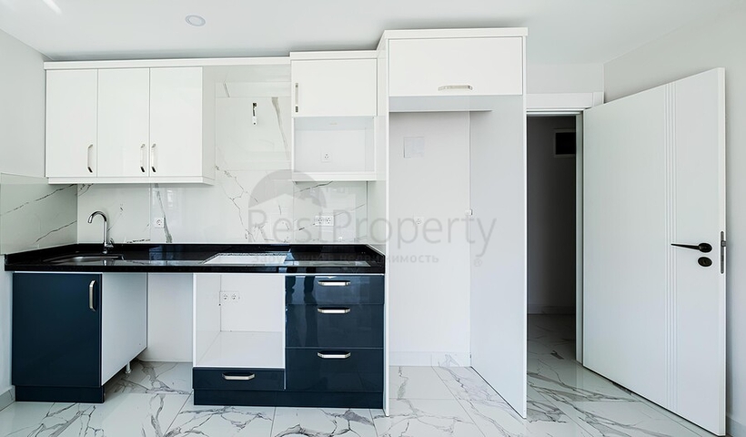 Квартира 2+1 в современном комплексе рядом с морем в Махмутларе