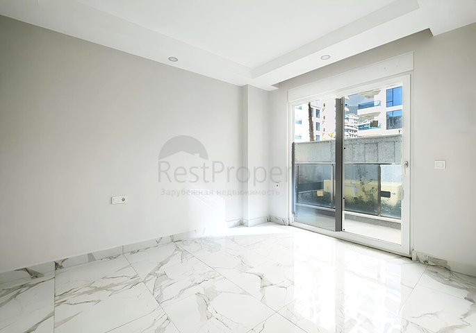 Квартира 2+1 в современном комплексе рядом с морем в Махмутларе