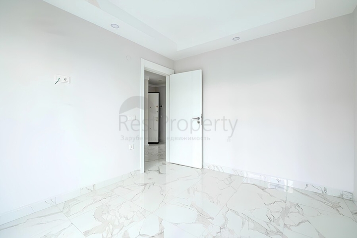 Квартира 2+1 в современном комплексе рядом с морем в Махмутларе