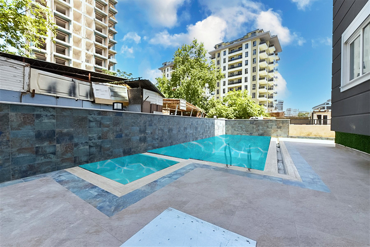 Квартира 2+1 в современном комплексе рядом с морем в Махмутларе