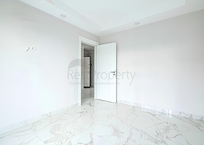 Квартира 2+1 в современном комплексе рядом с морем в Махмутларе