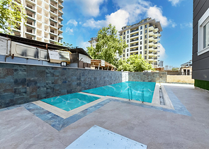 Квартира 2+1 в современном комплексе рядом с морем в Махмутларе