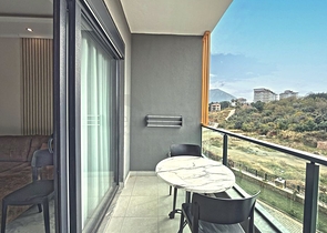 Аренда современной 1+1 квартиры в районе Оба