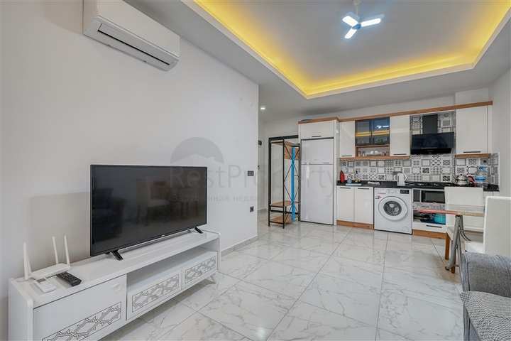 Современная меблированная квартира в новом комплексе в Махмутларе