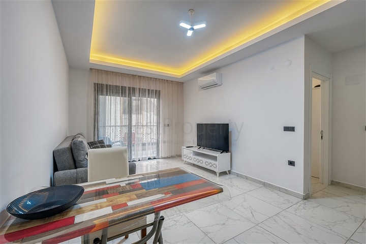 Современная меблированная квартира в новом комплексе в Махмутларе