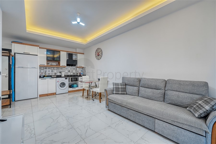 Современная меблированная квартира в новом комплексе в Махмутларе