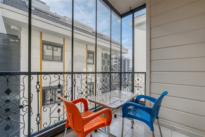 Современная меблированная квартира в новом комплексе в Махмутларе