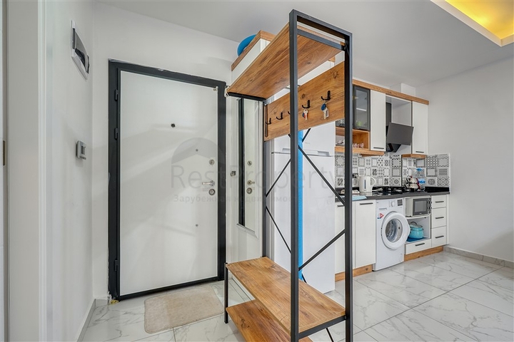 Современная меблированная квартира в новом комплексе в Махмутларе