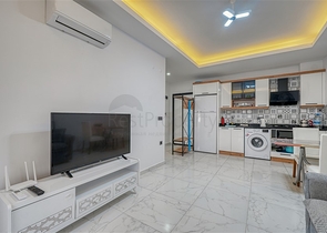 Современная меблированная квартира в новом комплексе в Махмутларе