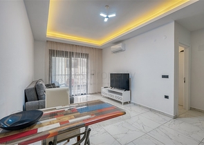 Современная меблированная квартира в новом комплексе в Махмутларе