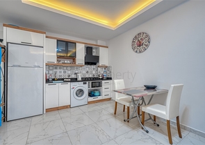 Современная меблированная квартира в новом комплексе в Махмутларе