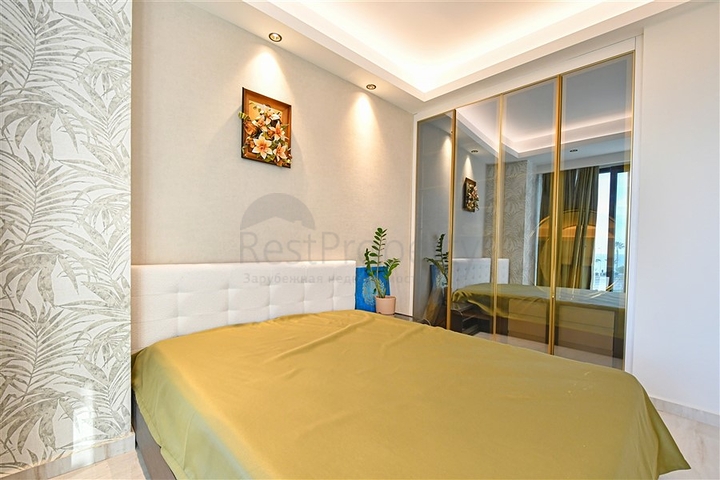 Двухкомнатная квартира с богатой инфраструктурой в районе Махмутлар