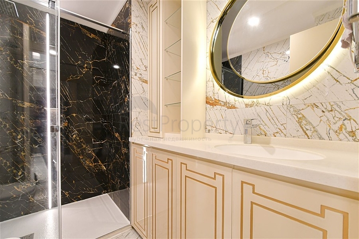 Двухкомнатная квартира с богатой инфраструктурой в районе Махмутлар