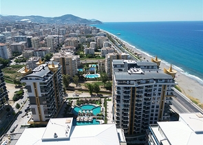 Двухкомнатная квартира с богатой инфраструктурой в районе Махмутлар