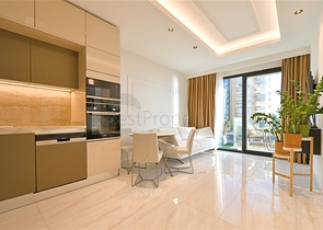 Двухкомнатная квартира с богатой инфраструктурой в районе Махмутлар