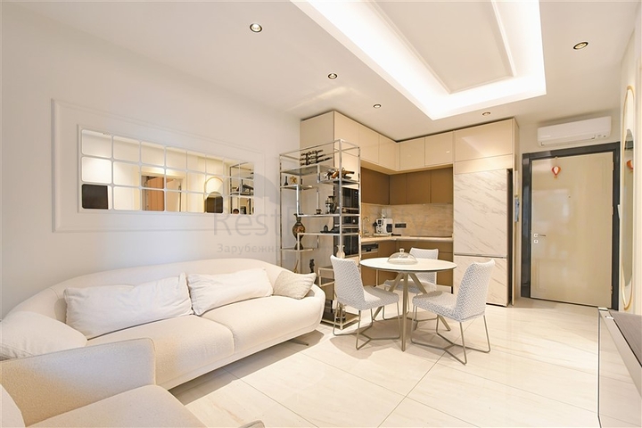 Двухкомнатная квартира для комфортной жизни в районе Махмутлар