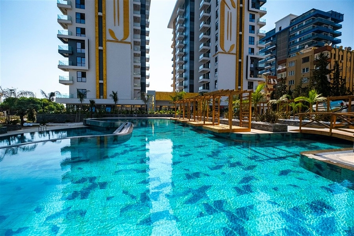 Двухкомнатная квартира для комфортной жизни в районе Махмутлар