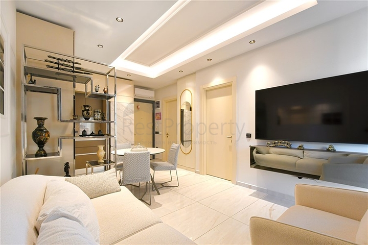 Двухкомнатная квартира для комфортной жизни в районе Махмутлар