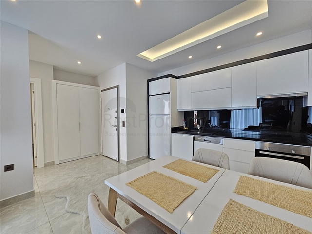 Двухкомнатная квартира 1+1 с развитой инфраструктурой в районе Махмутлар