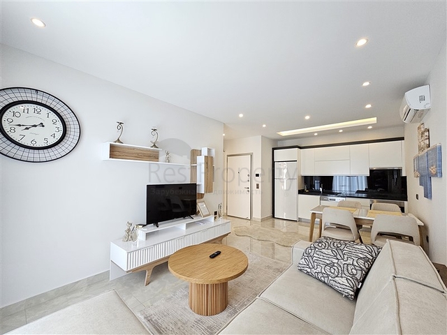 Двухкомнатная квартира 1+1 с развитой инфраструктурой в районе Махмутлар