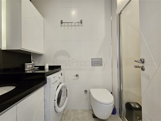 Двухкомнатная квартира 1+1 с развитой инфраструктурой в районе Махмутлар