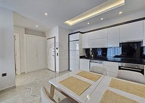 Двухкомнатная квартира 1+1 с развитой инфраструктурой в районе Махмутлар