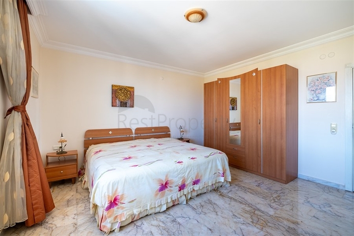 Двухкомнатная квартира с удобной планировкой в районе Махмутлар