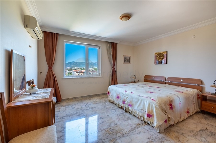 Двухкомнатная квартира с удобной планировкой в районе Махмутлар