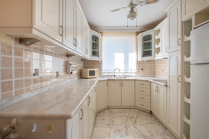 Двухкомнатная квартира с удобной планировкой в районе Махмутлар