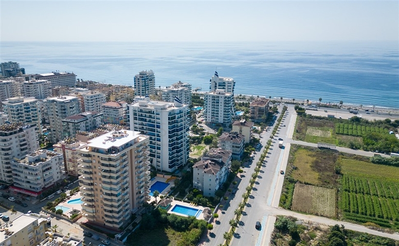 Двухкомнатная квартира с удобной планировкой в районе Махмутлар