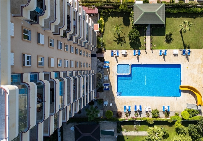 Двухкомнатная квартира с удобной планировкой в районе Махмутлар