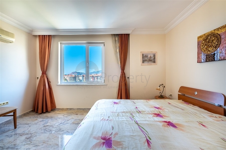 Двухкомнатная квартира с удобной планировкой в районе Махмутлар