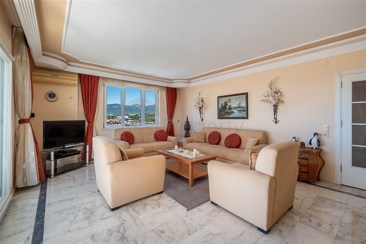 Двухкомнатная квартира с удобной планировкой в районе Махмутлар