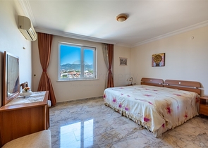 Двухкомнатная квартира с удобной планировкой в районе Махмутлар