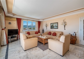 Двухкомнатная квартира с удобной планировкой в районе Махмутлар