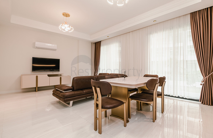 Двухкомнатный садовый дуплекс 2+1 с собственной террасой в районе Тюрклер