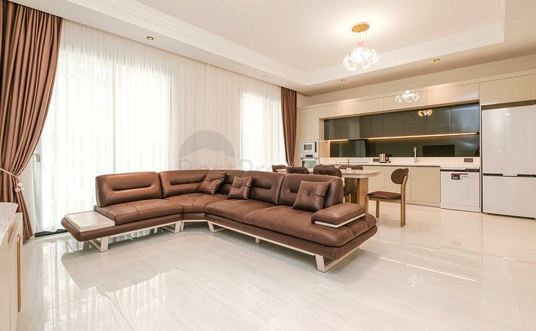 Двухкомнатный садовый дуплекс 2+1 с собственной террасой в районе Тюрклер