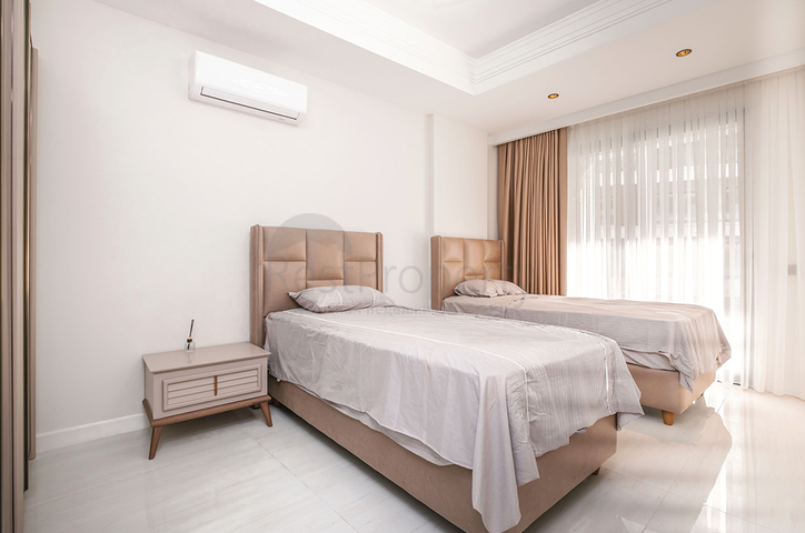 Двухкомнатный садовый дуплекс 2+1 с собственной террасой в районе Тюрклер