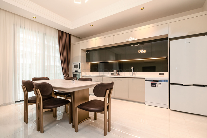 Двухкомнатный садовый дуплекс 2+1 с собственной террасой в районе Тюрклер