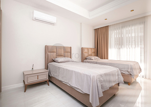 Двухкомнатный садовый дуплекс 2+1 с собственной террасой в районе Тюрклер