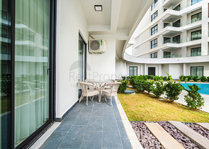 Двухкомнатный садовый дуплекс 2+1 с собственной террасой в районе Тюрклер