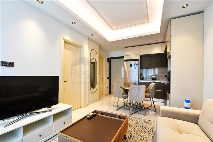 Двухкомнатная квартира 1+1 с современной инфраструктурой в районе Махмутлар